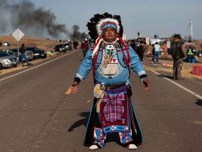 Download Native American Man Road Pictures | Wallpapers.com